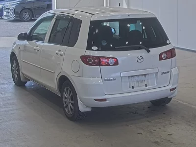 Mazda DEMIO  с аукциона в Японии