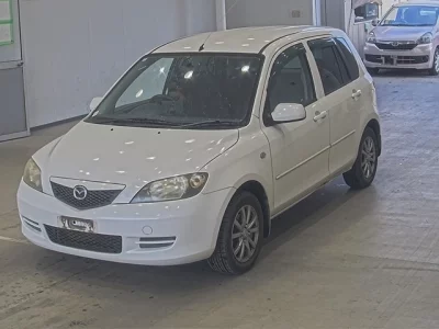 Mazda DEMIO  с аукциона в Японии