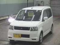 Mitsubishi EK SPORTS лот № 7025 оценка RA  с аукциона в Японии 2