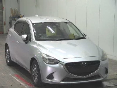 Mazda DEMIO  с аукциона в Японии