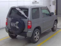 Nissan KIX лот № 3044 оценка 3.5  с аукциона в Японии 3