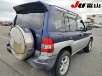Mitsubishi PAJERO IO лот № 1039 оценка 3  с аукциона в Японии 4