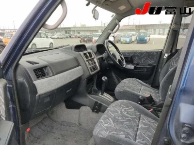 Mitsubishi PAJERO IO  с аукциона в Японии