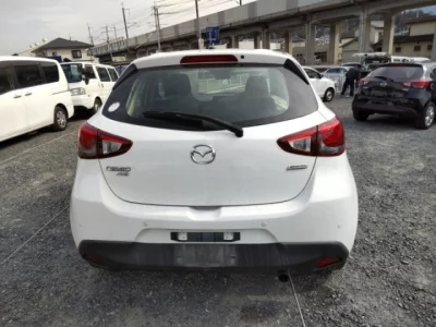 Mazda DEMIO  с аукциона в Японии