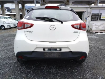 Mazda DEMIO  с аукциона в Японии