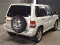 Mitsubishi PAJERO IO лот № 8170 оценка 3  с аукциона в Японии 4