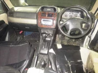 Mitsubishi PAJERO IO лот № 8170 оценка 3  с аукциона в Японии 2