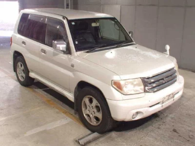 Mitsubishi PAJERO IO  с аукциона в Японии