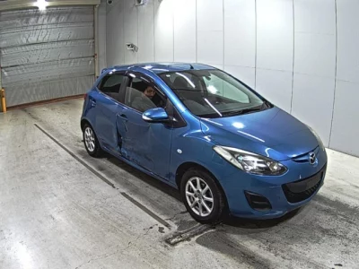 Mazda DEMIO  с аукциона в Японии