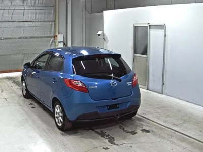 Mazda DEMIO  с аукциона в Японии
