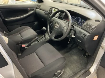 Toyota COROLLA RUNX  с аукциона в Японии