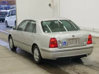 Toyota PROGRES лот № 2083 оценка RA  с аукциона в Японии 1