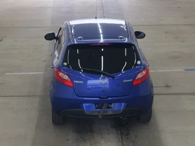 Mazda DEMIO  с аукциона в Японии