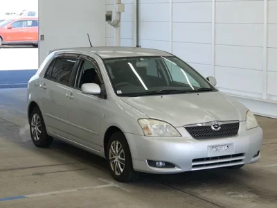 Toyota COROLLA RUNX  с аукциона в Японии