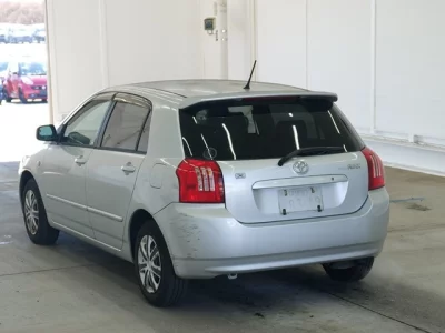 Toyota COROLLA RUNX  с аукциона в Японии