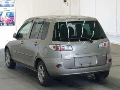 Mazda DEMIO  с аукциона в Японии