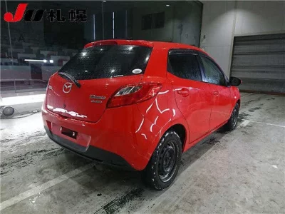 Mazda DEMIO  с аукциона в Японии
