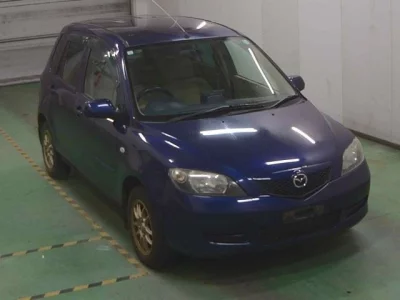 Mazda DEMIO  с аукциона в Японии