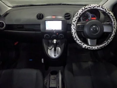 Mazda DEMIO  с аукциона в Японии