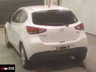 Mazda DEMIO  с аукциона в Японии
