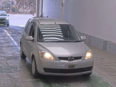 Mazda DEMIO  с аукциона в Японии
