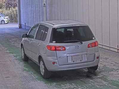 Mazda DEMIO  с аукциона в Японии