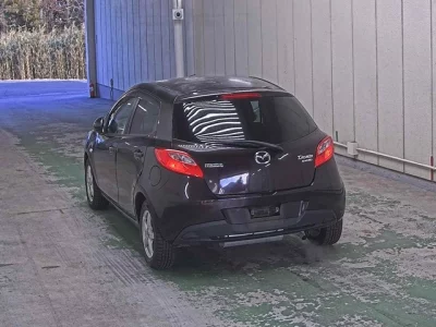 Mazda DEMIO  с аукциона в Японии