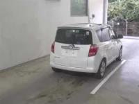 Toyota RACTIS лот № 124 оценка R  с аукциона в Японии 4