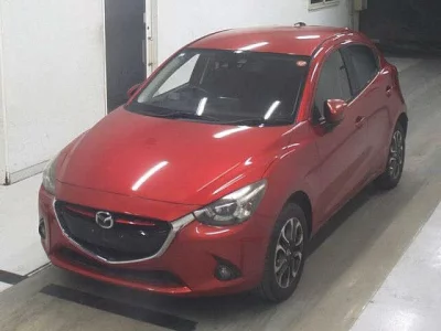 Mazda DEMIO  с аукциона в Японии