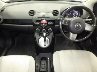 Mazda DEMIO  с аукциона в Японии