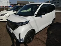 Nissan SAKURA лот № 3910 оценка 6  с аукциона в Японии 2