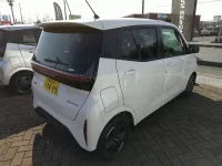 Nissan SAKURA лот № 3910 оценка 6  с аукциона в Японии 3