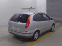 Nissan TINO лот № 7012 оценка 4  с аукциона в Японии 3