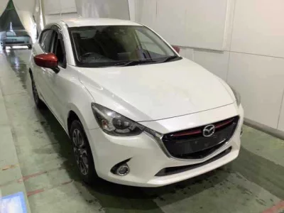 Mazda DEMIO  с аукциона в Японии