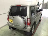 Mitsubishi PAJERO MINI лот № 1076 оценка R  с аукциона в Японии 1