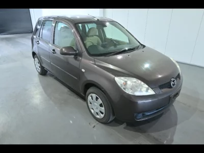 Mazda DEMIO  с аукциона в Японии