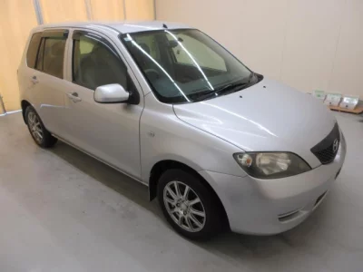Mazda DEMIO  с аукциона в Японии