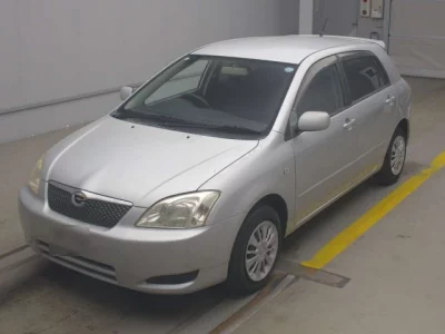 Toyota COROLLA RUNX  с аукциона в Японии