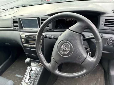 Toyota COROLLA RUNX  с аукциона в Японии