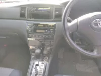 Toyota COROLLA RUNX лот № 2557 оценка 3.5  с аукциона в Японии 4