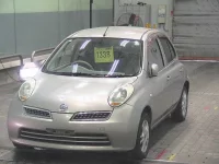 Nissan MARCH лот № 7338 оценка 3.5  с аукциона в Японии 2