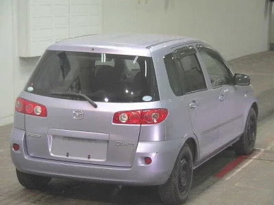 Mazda DEMIO  с аукциона в Японии