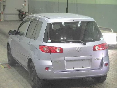 Mazda DEMIO  с аукциона в Японии