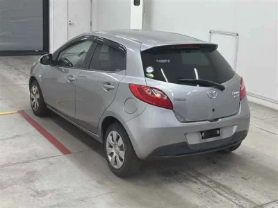 Mazda DEMIO  с аукциона в Японии