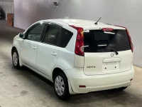 Nissan NOTE лот № 1064 оценка 4  с аукциона в Японии 1