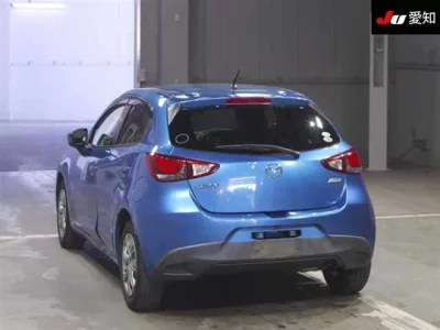 Mazda DEMIO  с аукциона в Японии