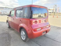 Nissan CUBE лот № 7504 оценка 3.5  с аукциона в Японии 1