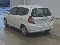 Honda FIT лот № 1504 оценка RA  с аукциона в Японии 1