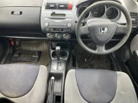 Honda FIT лот № 1504 оценка RA  с аукциона в Японии 3