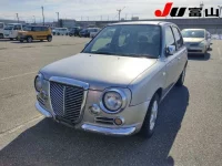 Nissan MARCH лот № 1002 оценка 3.5  с аукциона в Японии 3